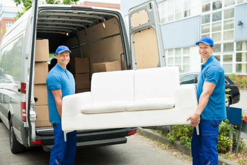Professional packing team preparing household items in a Hampstead home