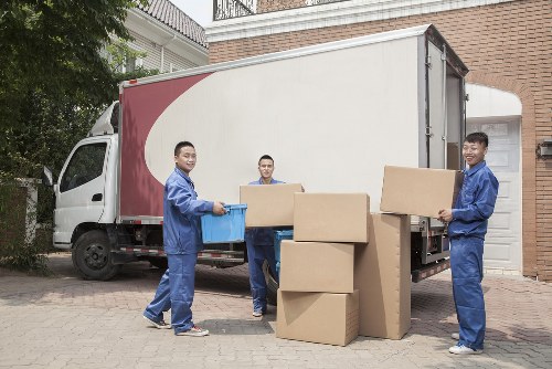 Removal team planning a Hampstead home move on a residential street