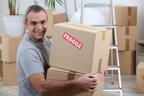 House moving team working in a Hampstead residential street