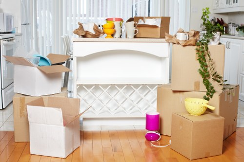 Packed office furniture ready for transport in Hampstead