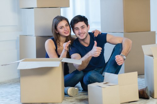Packed household boxes and wrapped furniture ready for a Hampstead home removal