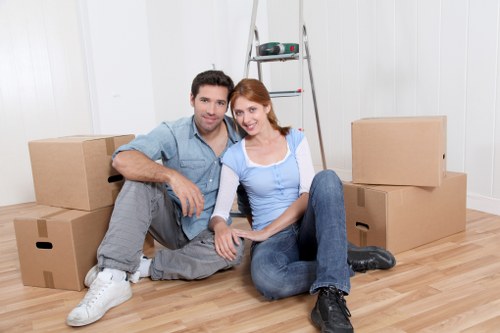 Trained removals staff handling fragile items with care in Hampstead