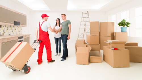 Office relocation setup with boxes and equipment for a Hampstead business move