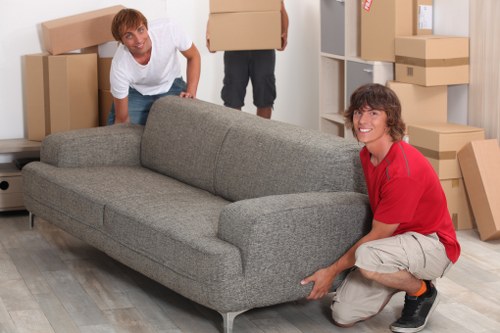 Packed office boxes and labelled items for a Hampstead business relocation