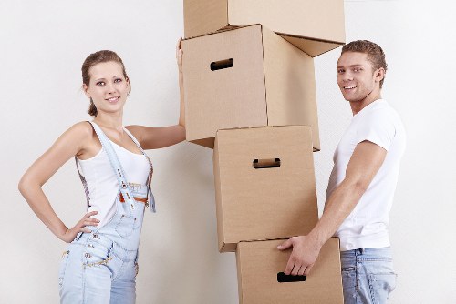 Packed moving boxes and furniture ready for transport in Hampstead