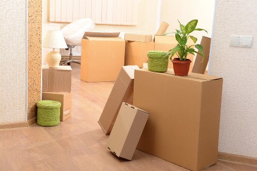 Professional movers handling belongings in a Hampstead property