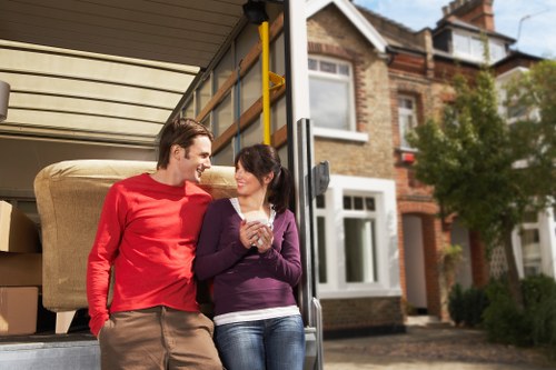 Packing and transporting office equipment during a Hampstead business move